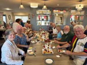 Chartwell House Unites Veterans at Cream Tea Celebration thumb item #1